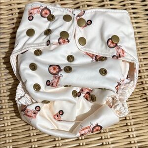 Little One Reusables Cream Baby Diaper Cover with Tractor Print